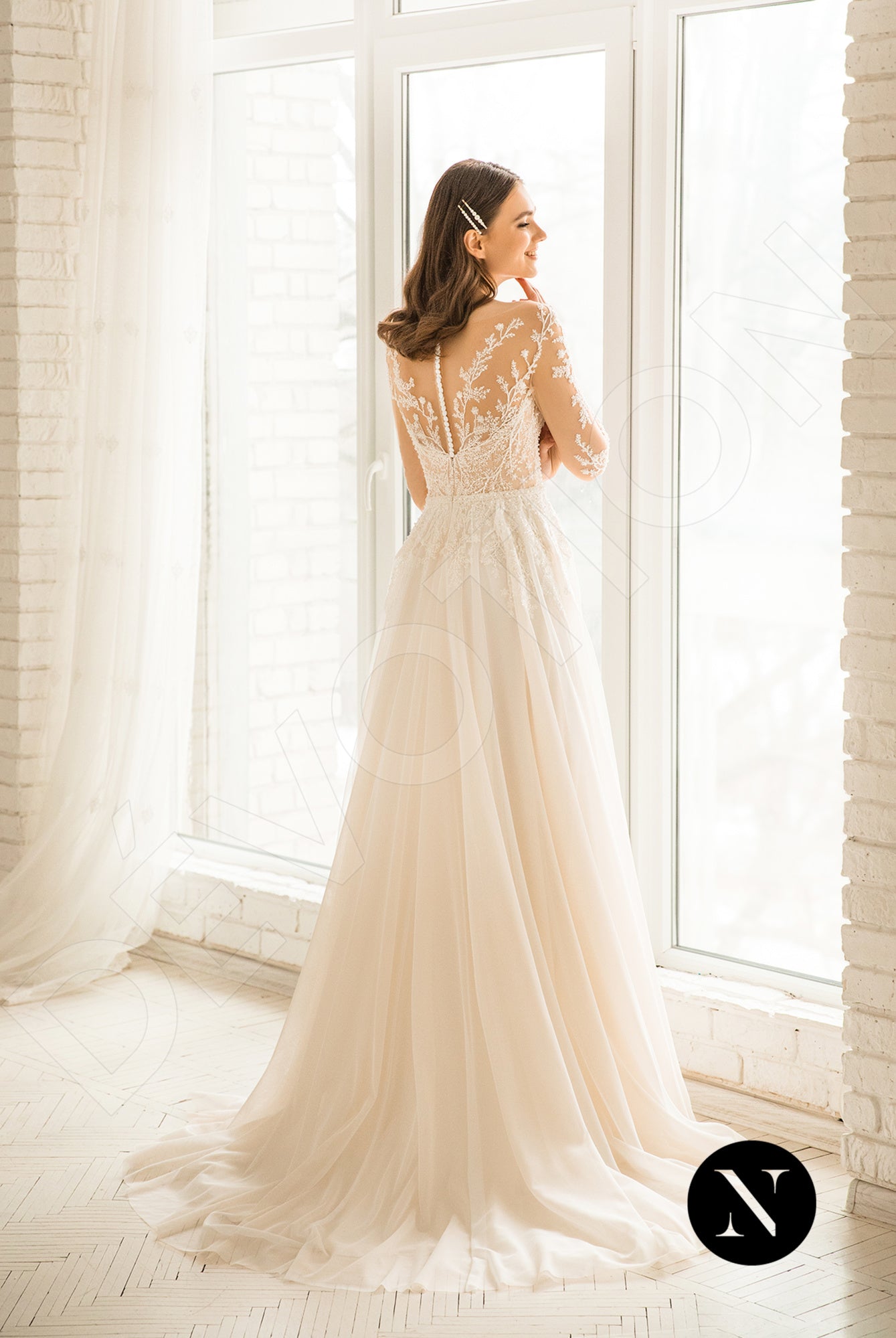 Classic ivory a-line wedding dress with lace applique and sheer illusion  straps