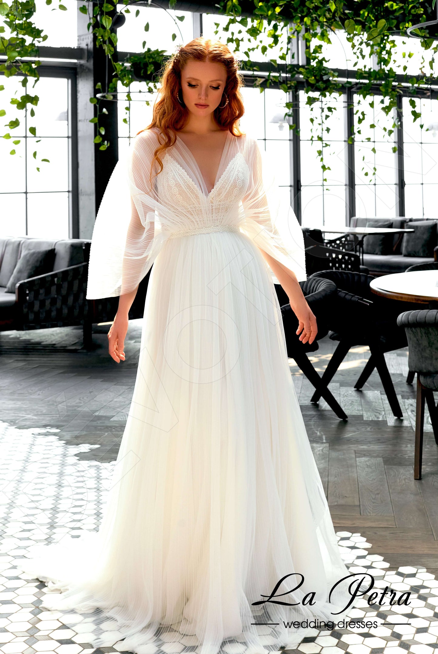 Ozara Open back A-line Long sleeve Wedding Dress Front