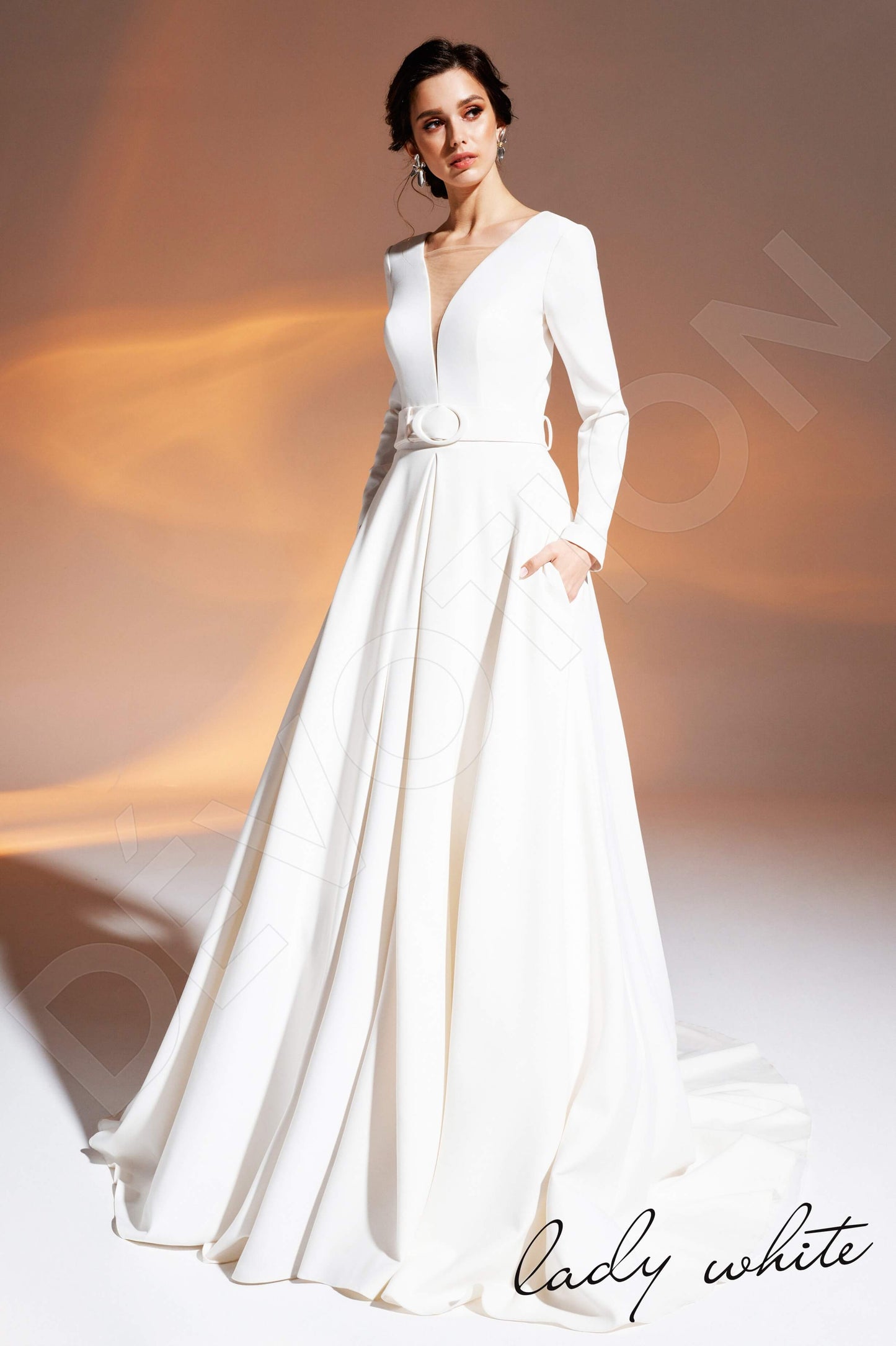 Panya Illusion back A-line Long sleeve Wedding Dress Front